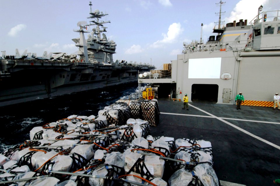 US Navy 080106-N-5758H-300 The Nimitz-class nuclear-powered aircraft carrier USS Harry S. Truman (CVN 75) and the Military Sealift Command fast-combat support ship USNS Arctic (T-AOE 8) sail side-by-side