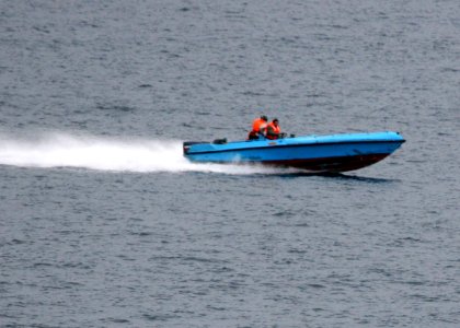 US Navy 080106-N-0000X-004 mall craft suspected to be from the Islamic Republic of Iran Revolutionary Guard Navy (IRGCN), maneuver aggressively in close proximity of U.S. Navy ships