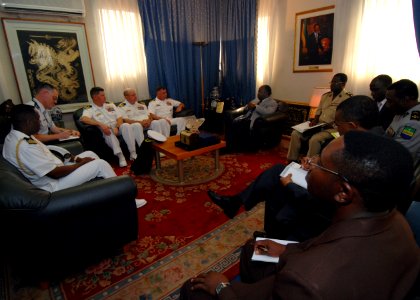 US Navy 080107-N-4044H-013 Capt. John B. Nowell Jr., commodore, Africa Partnership Station (APS) meets with Ali-Ben Bongo, Gabonese minister of defense, to discuss APS