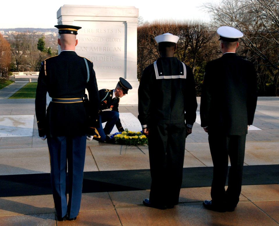 US Navy 080108-N-9769P-002 Chief Machinist's Mate Phillip Wharton and Machinist's Mate 1st Class Jeffrey Harp, along with a Tomb guard lay a wreath at the Tomb of the Unknown Soldier on behalf of Commander, Navy Recruiting Comm