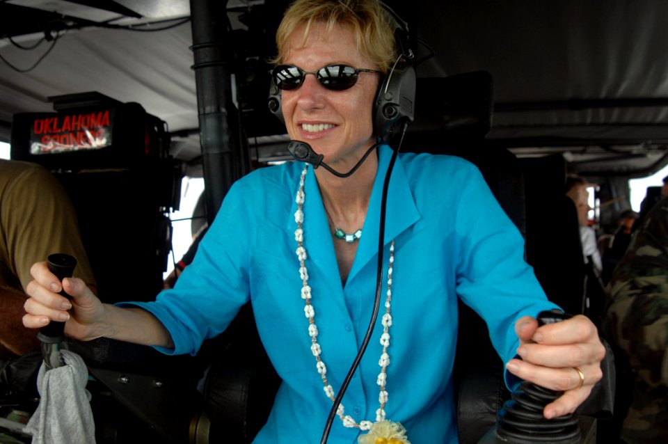 US Navy 080111-N-7286M-114 U.S. Ambassador to the Philippines Kristie A. Kenney operates a Special Boat Team 12 MK V special operation craft in the Moro Gulf