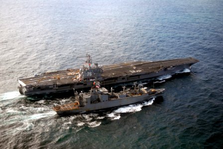US Navy 080109-N-0555B-004 The Nimitz-class nuclear-powered aircraft carrier USS Ronald Reagan (CVN 76) and the Military Sealift Command ammunition ship USNS Flint (T-AE 32) steam alongside one another during an underway replen