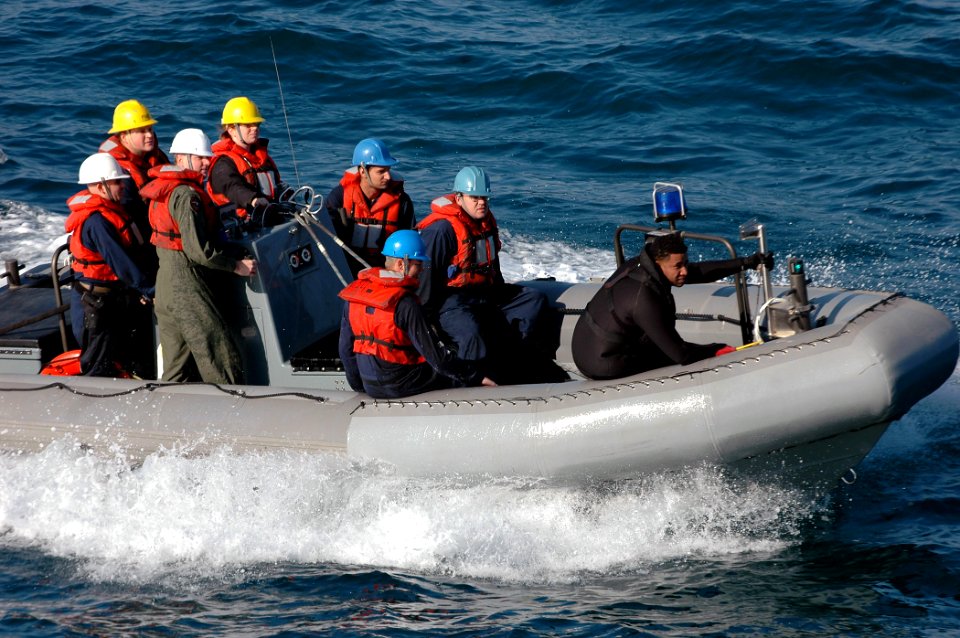 US Navy 080109-N-4879G-283 Search and Rescue (SAR) Swimmers aboard the Nimitz-class nuclear-powered aircraft carrier USS Harry S. Truman (CVN 75) use a Rigid Hull Inflatable Boat (RHIB) to conduct open water SAR training