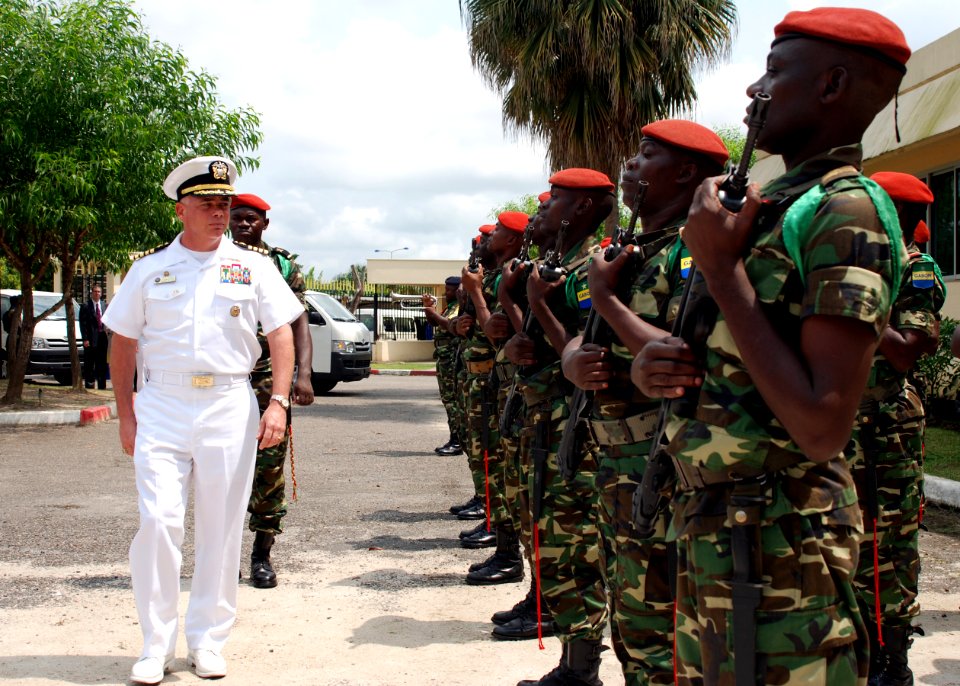 US Navy 080107-N-4044H-049 Capt. John B. Nowell Jr., commodore, Africa Partnership Station (APS) is greeted by Gabonese Army as he arrives at a scheduled meeting with General Ntori Longo, chief of Gabonese Armed Services, about