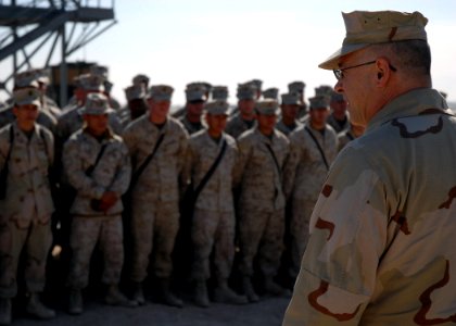 US Navy 080108-N-3857R-002 Capt. Hans Probst, Commander, 30th Naval Construction Regiment, speaks at a ceremony officially opening a newly renovated runway at Camp Taqaddum