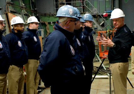 US Navy 080114-N-8273J-159 hief of Naval Operations (CNO) Adm. Gary Roughead talks with crewmembers of the pre-commissioned Littoral Combat Ship (LCS) unit Freedom while visiting Marinette Marine Shipyard