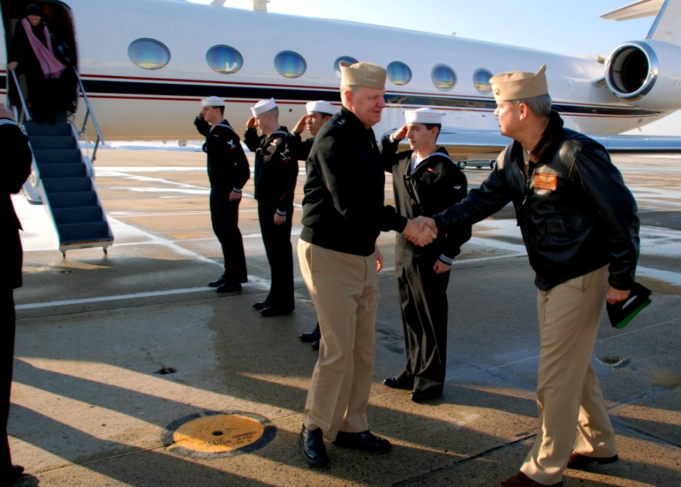 US Navy 080108-N-6159A-001 Capt. George G. Womack, commanding officer of Naval Air Station Brunswick, greets Chief of Naval Operations (CNO) Adm. Gary Roughead on the flight line at NAS Brunswick