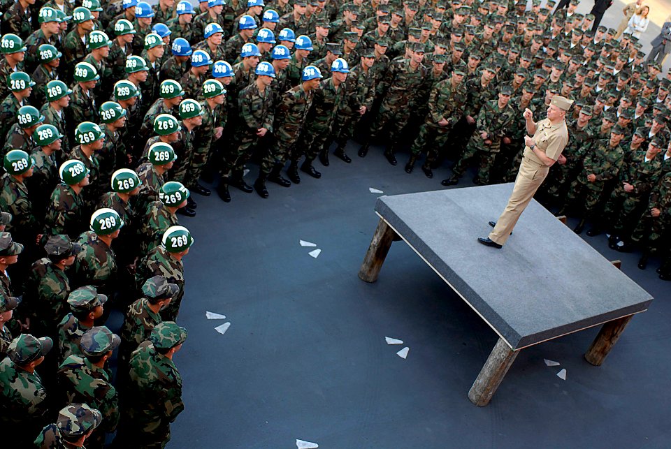 US Navy 080110-N-8273J-278 Adm. Gary Roughead, Chief of Naval Operations (CNO), talks with candidates from Basic Underwater Demolition-SEAL (BUD-S) class 268 and other members of the special warfare community during an all-hand
