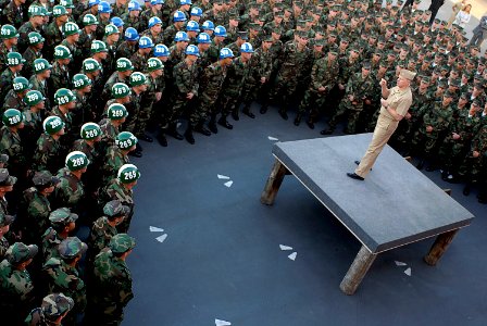 US Navy 080110-N-8273J-278 Adm. Gary Roughead, Chief of Naval Operations (CNO), talks with candidates from Basic Underwater Demolition-SEAL (BUD-S) class 268 and other members of the special warfare community during an all-hand