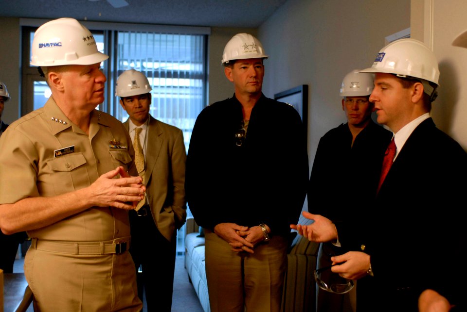 US Navy 080111-N-8273J-033 Chief of Naval Operations (CNO) Adm. Gary Roughead talks with project managers while touring Pacific Beacon, the Navy's first large-scale housing privatization facility for single Sailors