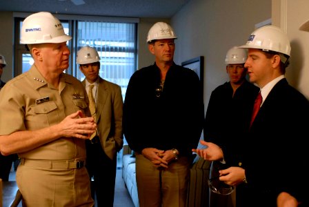 US Navy 080111-N-8273J-033 Chief of Naval Operations (CNO) Adm. Gary Roughead talks with project managers while touring Pacific Beacon, the Navy's first large-scale housing privatization facility for single Sailors