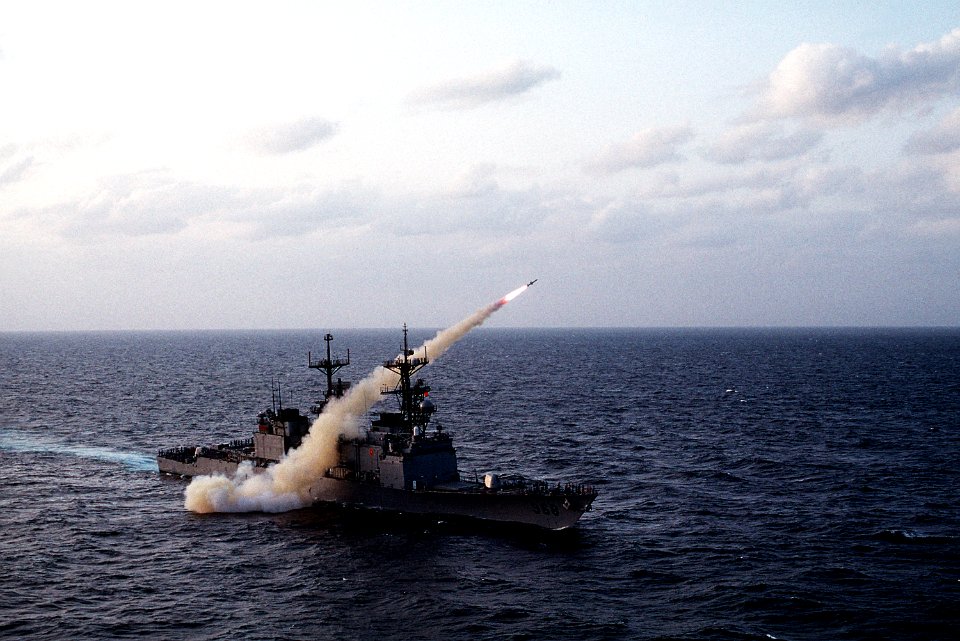 USS ARTHUR W. RADFORD (DD-968) fires a Harpoon missile during an Operation Red Reef III