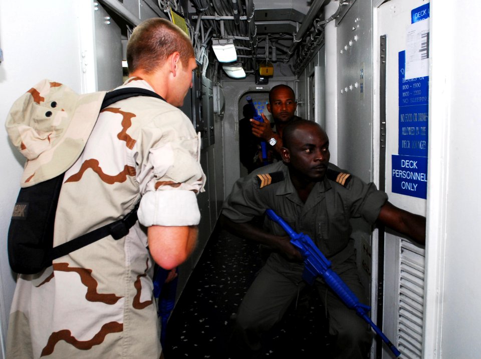 US Navy 080114-N-8933S-057 Seaman Perry Bishop trains Gabonese Sailors on basic visit, board, search and seizure techniques to enhance their regional and maritime safety and security