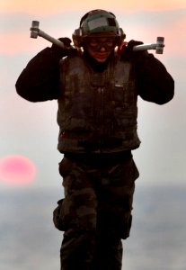 US Navy 080114-N-2984R-033 Aviation Boatswain's Mate Airman John M. Pintore, assigned to Air Department aboard the Nimitz-class nuclear-powered aircraft carrier USS Harry S. Truman (CVN 75)
