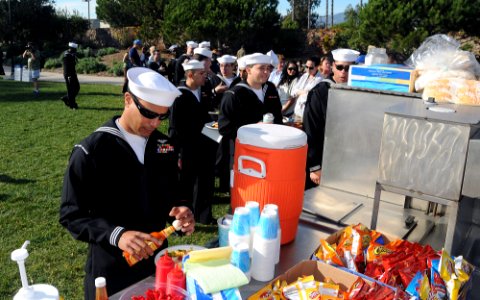 US Navy 080112-N-1722M-004 Sailors assigned to the Nimitz-class nuclear-powered aircraft carrier USS Ronald Reagan (CVN 76) enjoy free food at Chase Palm Park during a free concert put on for their benefit photo