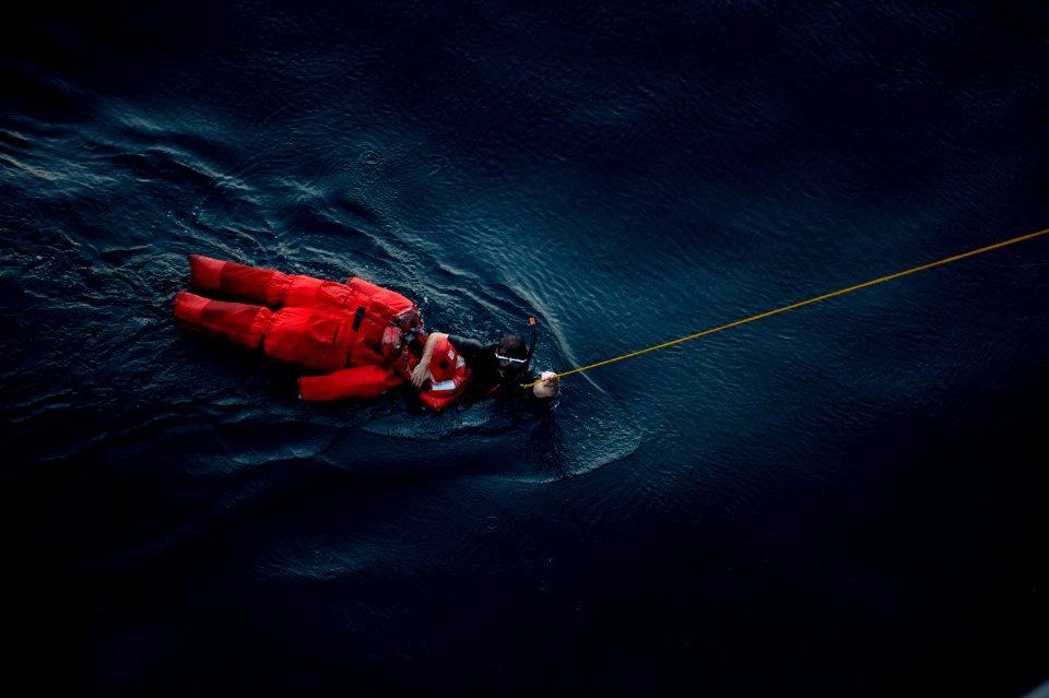 USS Arleigh Burke search and rescue swimmer 140624-N-WD757-130