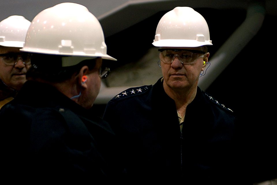 US Navy 080114-N-8273J-127 Chief of Naval Operations (CNO) Adm. Gary Roughead tours the pre-commissioning unit littoral combat ship (LCS) Freedom while visiting Marinette Marine Shipyard