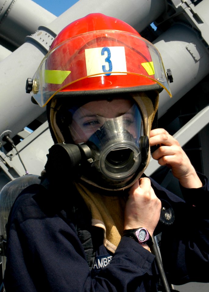 US Navy 080123-N-4649C-029 Damage Controlman Fireman Jessica Lambert prepares for a rescue and assistance drill aboard the guided-missile cruiser USS Shiloh (CG 67)