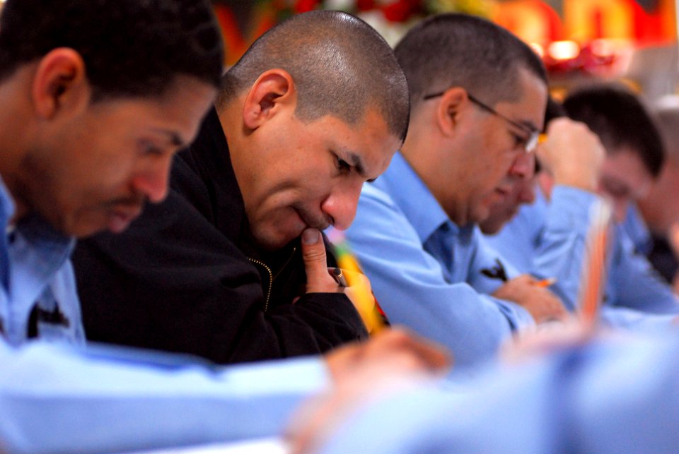 US Navy 080117-N-7526R-087 Aviation Boatswain's Mate (handling) 1st Class Ruben Martinez concentrates on a question during the chief petty officer exam aboard the Nimitz-class nuclear-powered aircraft carrier USS Ronald Reagan