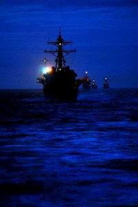 US Navy 080126-N-7981E-165 Ships assigned to USS Abraham Lincoln Strike Group, led by the guided missile destroyer USS Momsen (DDG 92) during a straight transit exercise photo