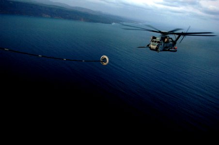 US Navy 080119-F-1644L-122 A U.S. Marine Corps CH-53 Sea Stallion, assigned to Marine Heavy Helo Squadron 464, based at Marine Corps Air Station, Jacksonville, N.C., prepares to refuel from a U.S. Air Force HC-130