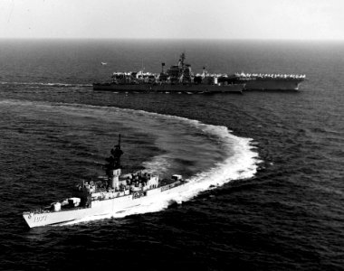 USS Badger (FF-1071) turns away after refueling from USS Sacramento (AOE-1) in the Pacific Ocean on 16 March 1978