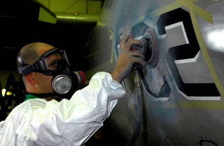 US Navy 080122-N-0455L-157 viation Structural Mechanic 2nd Class James Flynn assigned to the