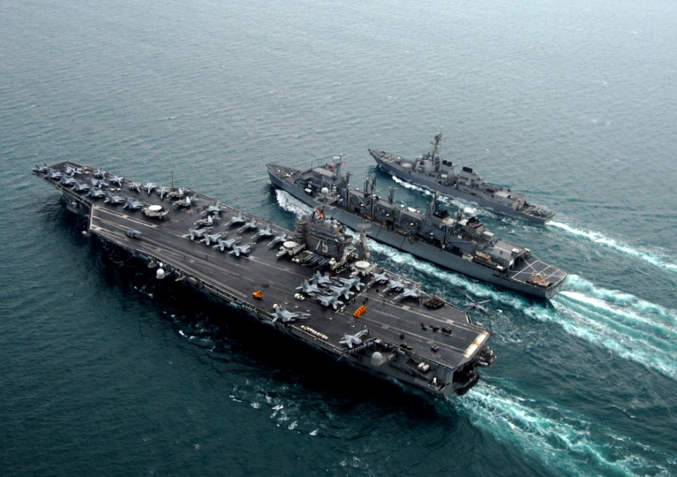 US Navy 080123-N-0535P-580 The Nimitz-class aircraft carrier USS Harry S. Truman (CVN 75), left, performs a replenishment at sea