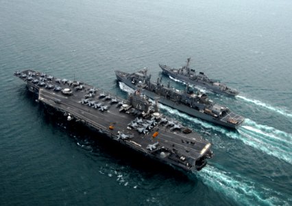 US Navy 080123-N-0535P-580 The Nimitz-class aircraft carrier USS Harry S. Truman (CVN 75), left, performs a replenishment at sea