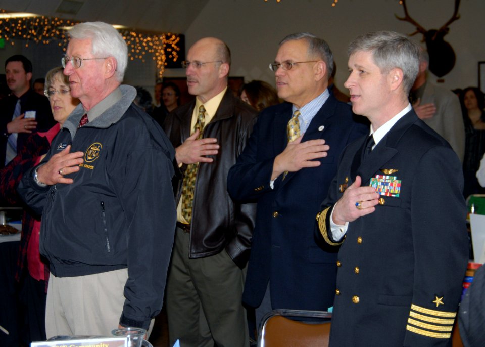 US Navy 080117-N-9860Y-001 Dick Devlin, Oak Harbor Navy League president, Jim Slowik, Mayor of Oak Harbor, and Capt. Gerral David, Naval Air Station (NAS) Whidbey Island commanding officer, recite the