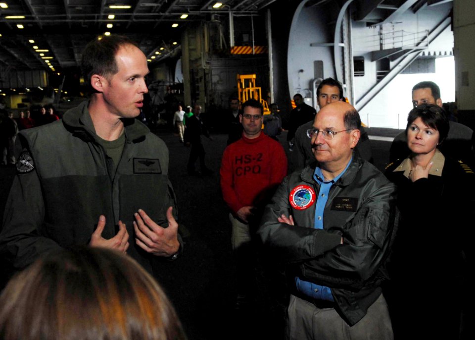US Navy 080126-N-1229B-033 Secretary of the Navy (SECNAV) The Honorable Dr. Donald Winter is briefed by Cmdr. Terence Hoeft, executive officer of Helicopter Anti-submarine Squadron (HS) 2, about the capabilities of the SH-60F a