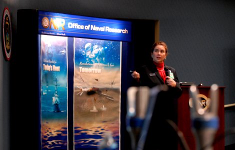 US Navy 080131-N-7676W-100 Dr. Elizabeth D'Andrea, program manager, electromagnetic railgun (EMRG) innovative Naval prototype, briefs attendees prior to the Navy's Office of Naval Research successful record-setting firing of an
