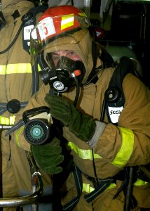US Navy 080122-N-4649C-074 The nozzleman on a fire team simulates cooling a hot spot during a fire drill aboard the guided-missile cruiser USS Shiloh (CG 67)