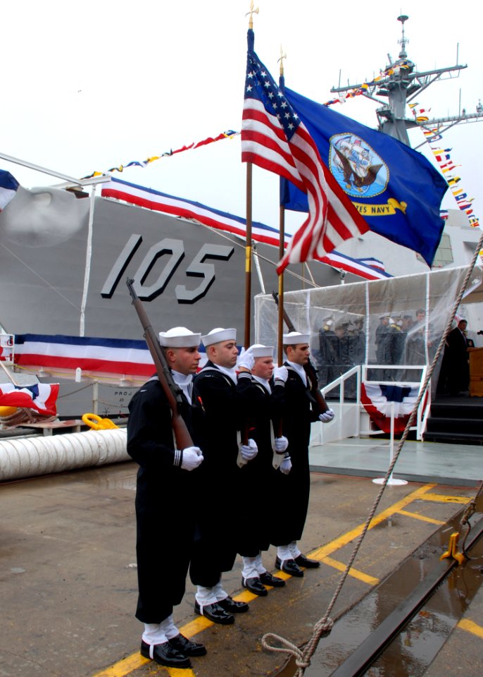 US Navy 080126-N-1120L-045 Members of Naval Mobile Construction Battalion (NMCB) 7 Color Guard parade the colors at the christening ceremony for Pre-commissioning Unit Dewey (DDG 105)