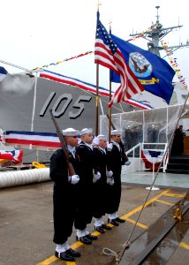 US Navy 080126-N-1120L-045 Members of Naval Mobile Construction Battalion (NMCB) 7 Color Guard parade the colors at the christening ceremony for Pre-commissioning Unit Dewey (DDG 105) photo