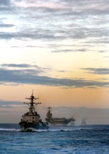 US Navy 080126-N-7981E-517 hips assigned to USS Abraham Lincoln Strike Group, led by the guided missile destroyer USS Momsen (DDG 92) during a straight transit exercise