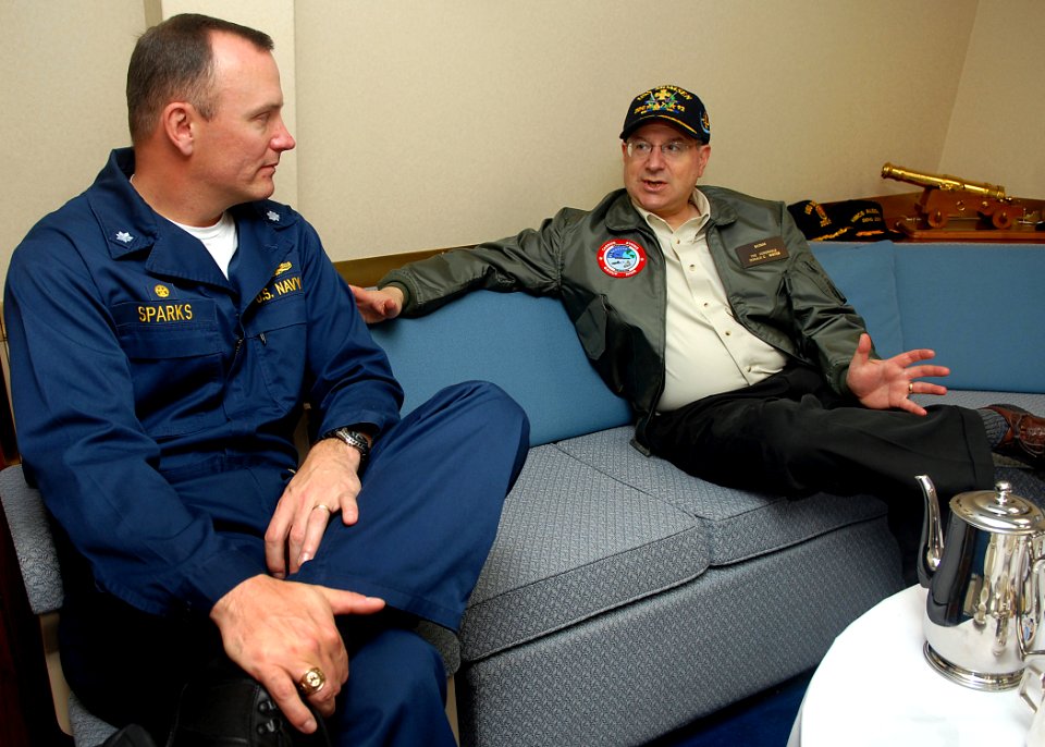 US Navy 080127-N-7981E-150 Secretary of the Navy (SECNAV) The Honorable Dr. Donald Winter speaks with Cmdr. Michael Sparks, commanding officer of the Arleigh Burke-class guided-missile destroyer USS Momsen (DDG 92) inside the s