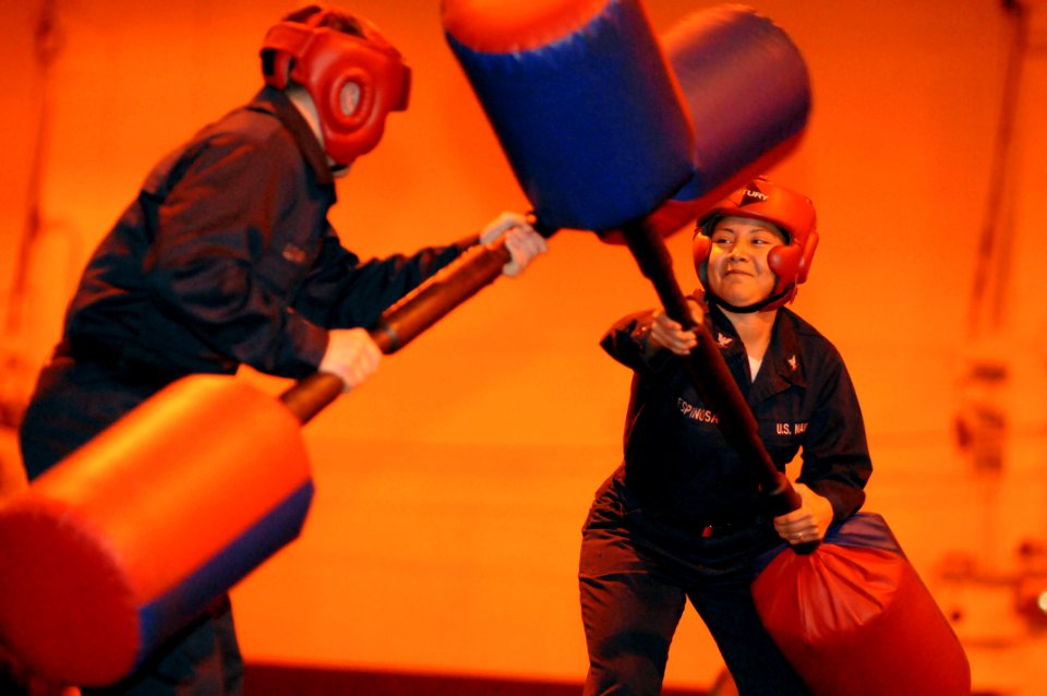 US Navy 080128-N-2959L-042 Aviation Maintenance Administrationman 3rd Class Laura Espinosa, right, assigned to the