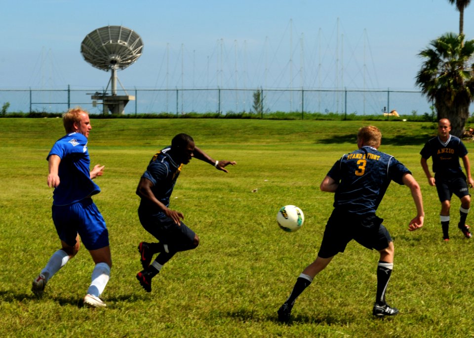 USS Anzio sailors play soccer 120919-N-NL541-129