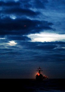 US Navy 080126-N-7981E-157 Ships assigned to USS Abraham Lincoln Strike Group, trail behind the guided missile destroyer USS Momsen (DDG 92) during a straight transit exercise