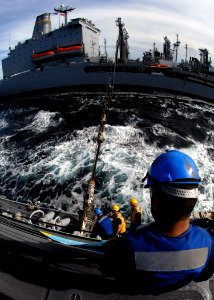 US Navy 080126-N-7981E-738 Sailors aboard the guided missile destroyer USS Momsen (DDG 92) secure refueling lines during a refueling at sea between Momsen and the Military Sealift Command Auxiliary Oiler USNS Guadalupe (T-AO 20 photo