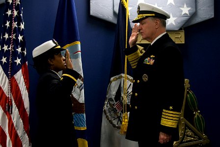US Navy 080131-N-8273J-403 Adm. Gary Roughead, Chief of Naval Operations, administers the oath of office to Yeoman 1st Class Tennille Hairston during a commissioning ceremony in the Hall of Heroes at the Pentagon