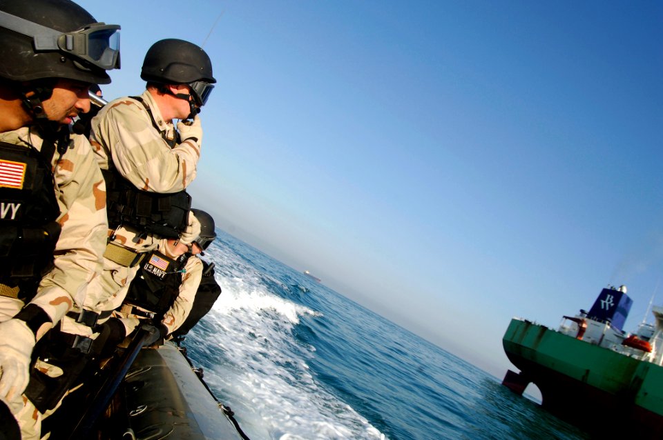US Navy 080206-N-2420K-101 Damage Controlman 3rd Class Matthew Villafuerte, left, and Chief Gunner's Mate Curtis Staybrook, both members of the guided-missile frigate USS Ingraham (FFG 61) visit, board, search and seizure team