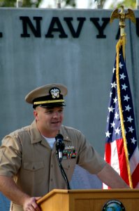 US Navy 080201-N-9909C-007 Ensign Steve Klinshaw speaks during his commissioning ceremony aboard Naval Amphibious Base Coronado photo