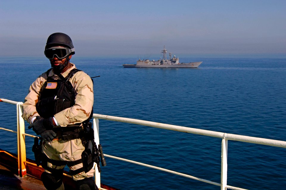 US Navy 080206-N-2420K-213 Storekeeper 3rd Class Devon Headley, a member of the guided-missile frigate USS Ingraham (FFG 61) visit, board, search and seizure team, stands watch