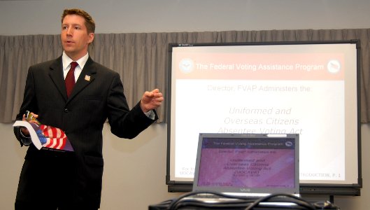 US Navy 080205-N-9758L-028 Scott Weidmann, deputy director of the Federal Voting Assistance Program (FVAP) explains the contents of the 2008-09 voting assistance guide during a FVAP workshop at the Navy legal office at Naval St