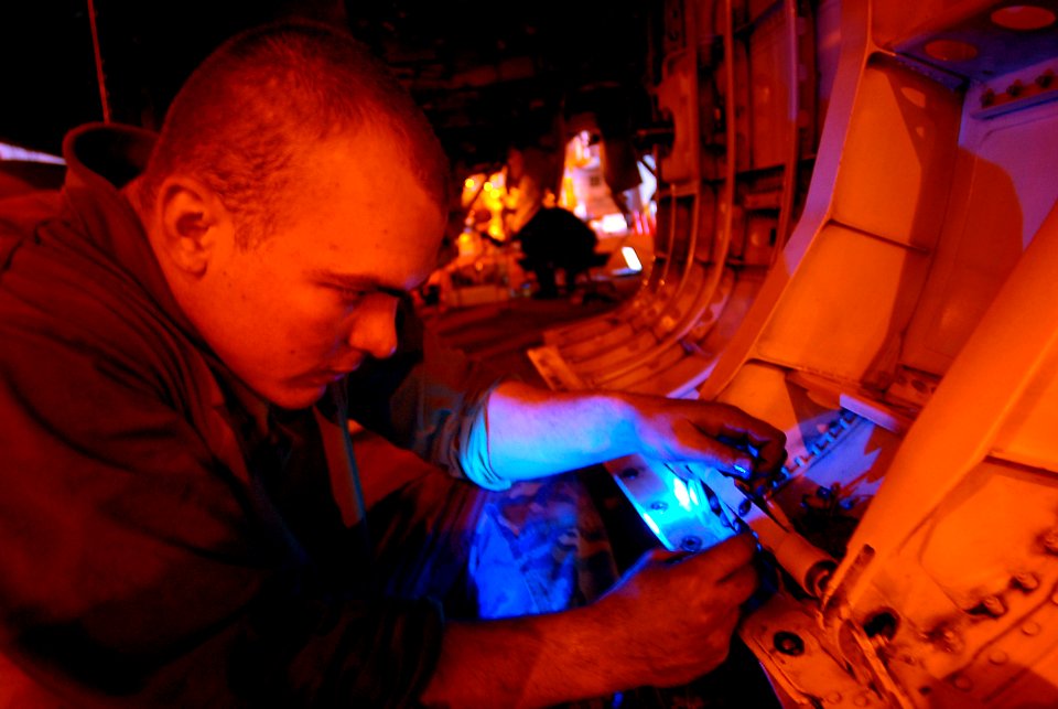 US Navy 080208-N-4879G-326 Aviation Mechanic's Mate 3rd Class Robert Scott, assigned to the