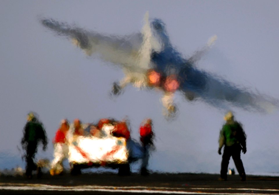 US Navy 080205-N-2984R-072 An F-A-18 Hornet launches off the flight deck during flight operations aboard the Nimitz-class aircraft carrier USS Harry S. Truman (CVN 75)