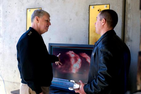 US Navy 080131-N-8273J-143 Chief of Naval Operations (CNO) Adm. Gary Roughead tours the test site after the successful test firing of the electromagnetic (EM) railgun demonstration at Naval Surface Warfare Center (NSWC) Dahlgre