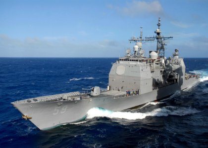 US Navy 080202-N-8421M-036 The guided-missile cruiser USS Princeton (CG 59) breaks away from the aircraft carrier USS Nimitz (CVN 68)